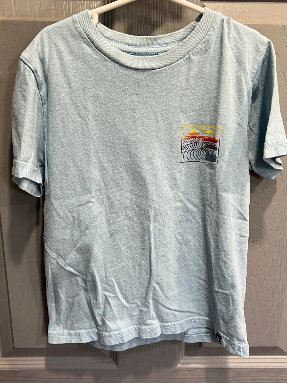 Quiksilver Light Blue Short-Sleeve Tee with Sunset Wave Graphic